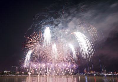 Firework display at night