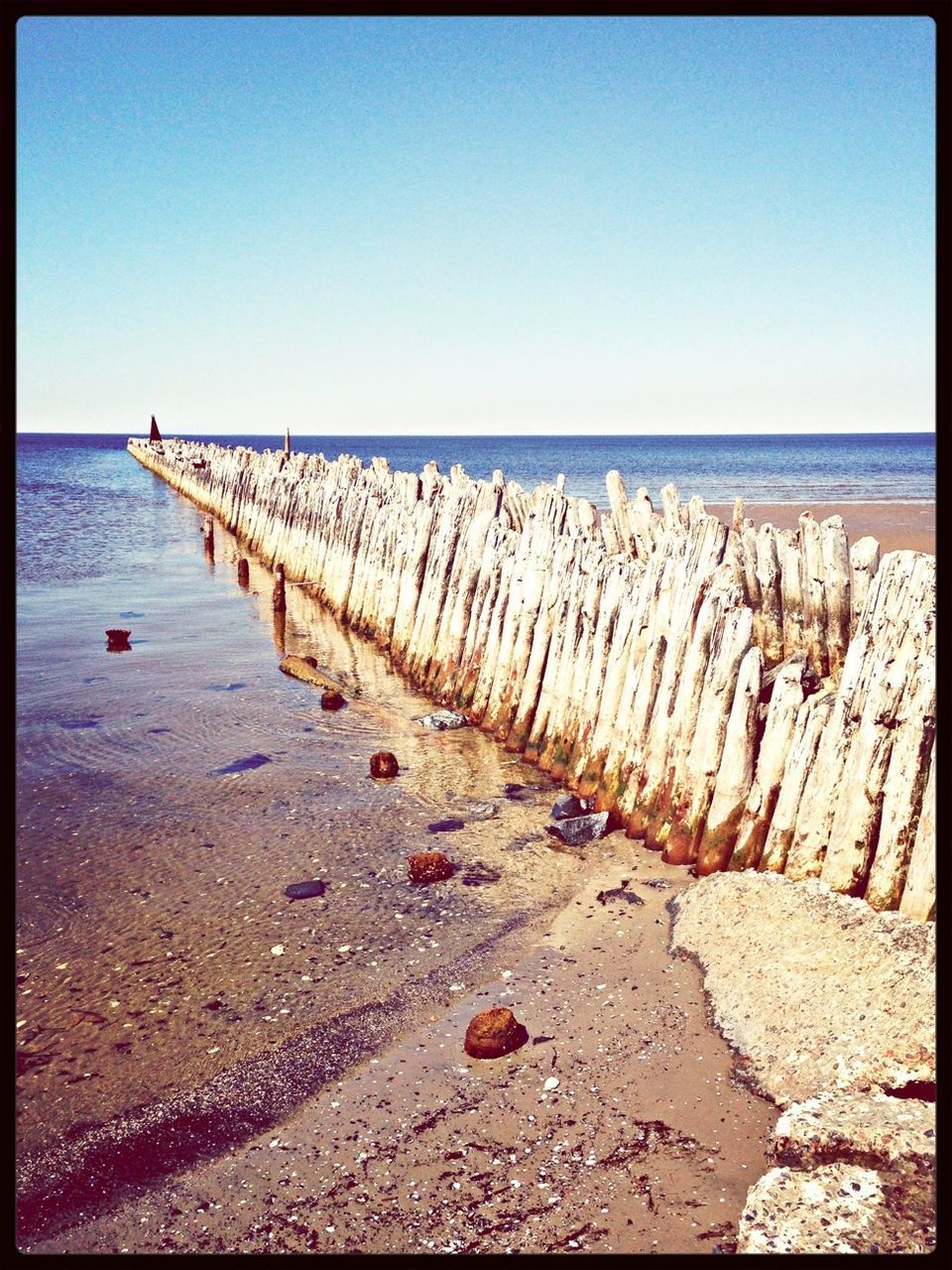 sea, beach, horizon over water, water, clear sky, shore, sand, tranquil scene, tranquility, copy space, blue, scenics, nature, beauty in nature, transfer print, auto post production filter, sky, day, sunlight, in a row