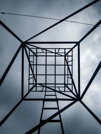 Low angle view of metallic structure against sky