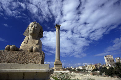 Low angle view of pompey pillar against sky