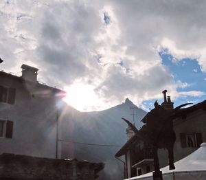 Sun shining through clouds