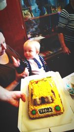 Father and son on cutting board