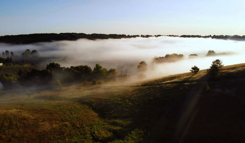 Scenic view of land against sky