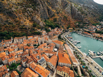 High angle view of river amidst buildings in town