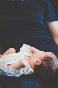 Portrait of happy woman lying down