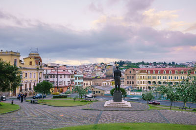 View of buildings against cloudy sky