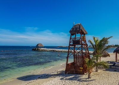 Scenic view of sea against blue sky