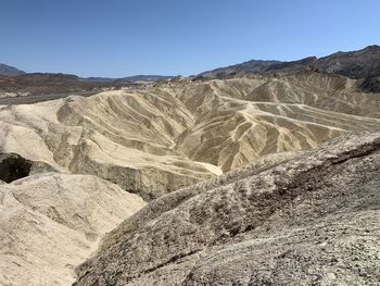 Scenic view of desert against clear sky