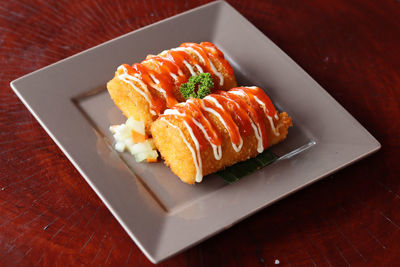 High angle view of sushi served on table