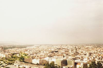 Cityscape against clear sky