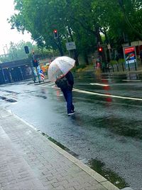 Boy walking on road