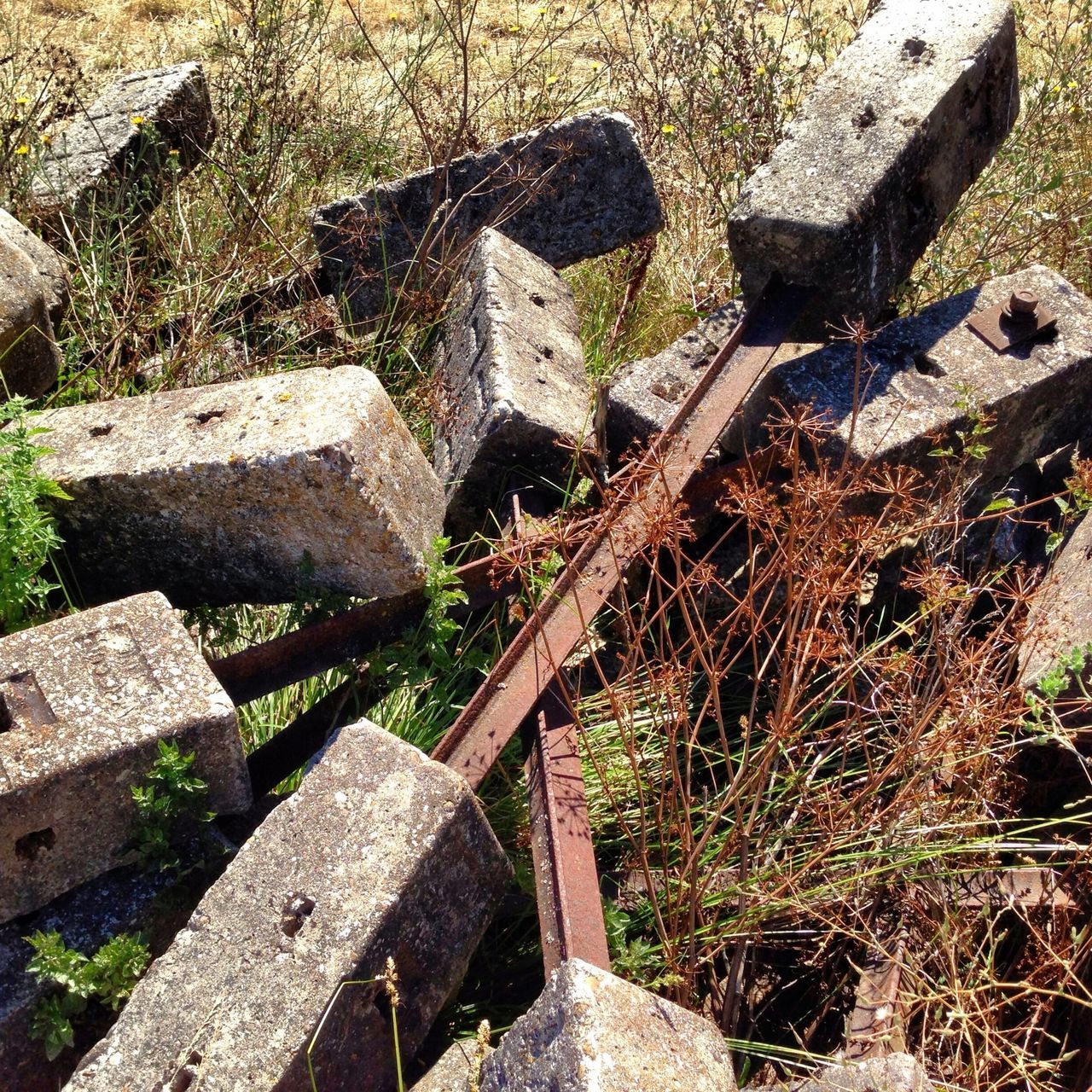 old, abandoned, damaged, obsolete, wood - material, deterioration, run-down, high angle view, weathered, close-up, field, rusty, metal, broken, day, bad condition, outdoors, no people, destruction, sunlight