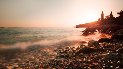 Scenic view of sea against sky during sunset