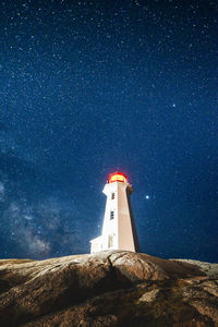 Stars over peggy's point lighthouse, nova scotia, canada