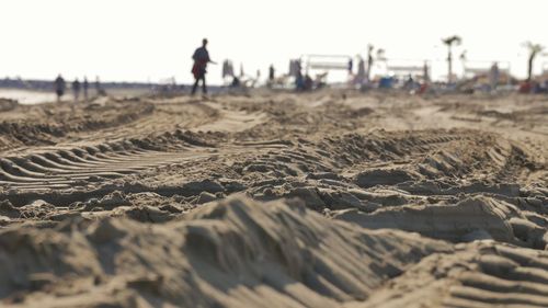 People walking on beach