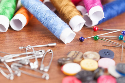 Close-up of sewing items on table