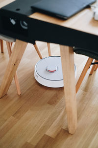 High angle view of equipment under table