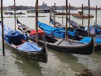 Boats moored in canal