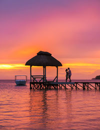 Scenic view of sea against sky during sunset