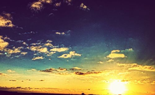 Low angle view of clouds in sky during sunset