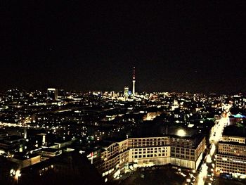 Illuminated city at night