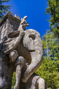 Low angle view of statue against clear sky