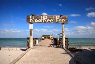 Rod and reel pier boardwalk on the island of anna maria, florida.