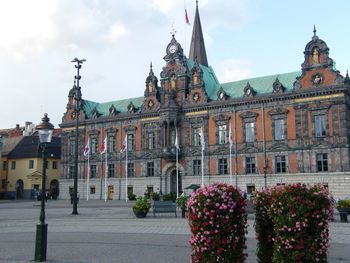 View of old building against cloudy sky