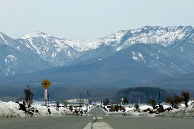 Scenic view of snow covered mountains