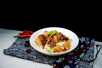 Close-up of food served on table