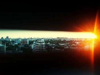 Cityscape against sky during sunset