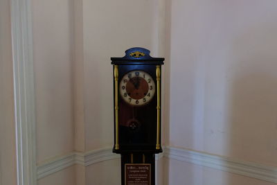 Close-up of telephone booth on wall