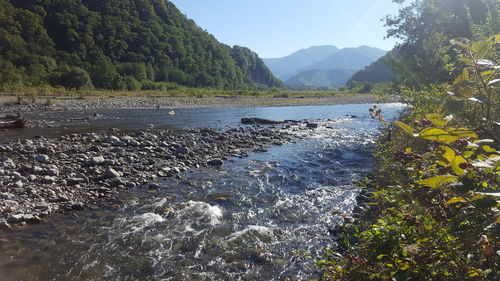 Scenic view of river against sky