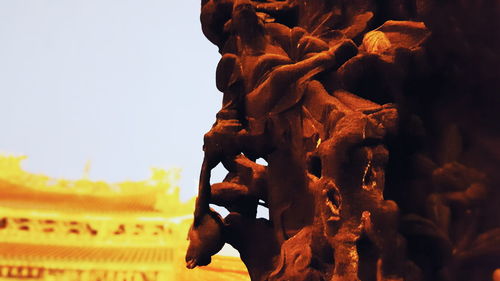 Low angle view of statue against clear sky