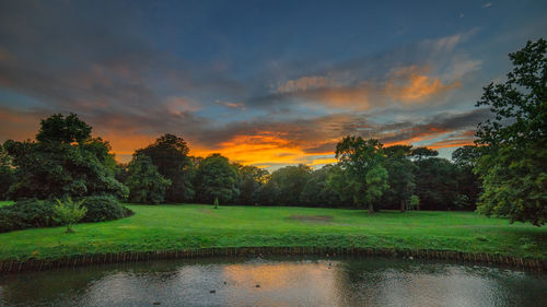 Scenic view of landscape against cloudy sky