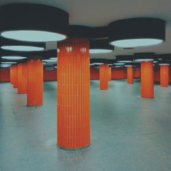 Close-up of red objects on tiled floor