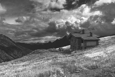 House on field against sky