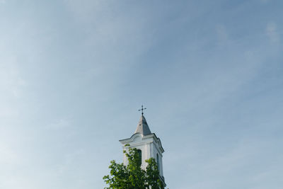 Low angle view of statue against sky