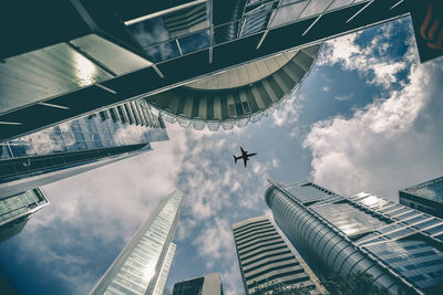 Low angle view of modern buildings against sky