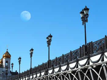 Low angle view of building against clear blue sky