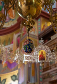 Low angle view of decoration hanging on ceiling at home