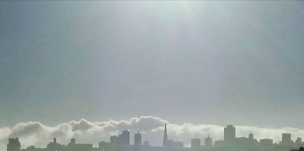 Low angle view of modern buildings against sky