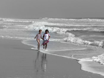 Full length of girl on beach