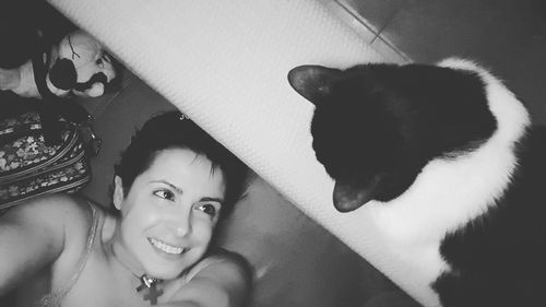 Portrait of woman with cat