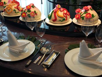 Close-up of cake served on table