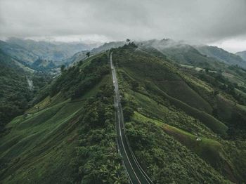 High angle view of road amidst mountains