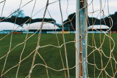 Close-up of soccer field by sea