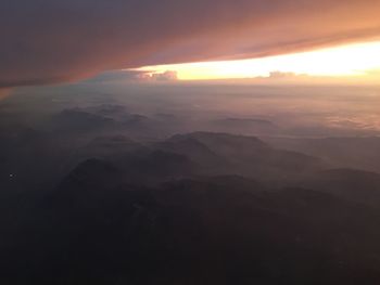 Scenic view of mountains against sky during sunset