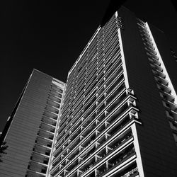 Low angle view of modern building at night