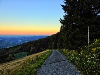 Surface level of country road at sunset